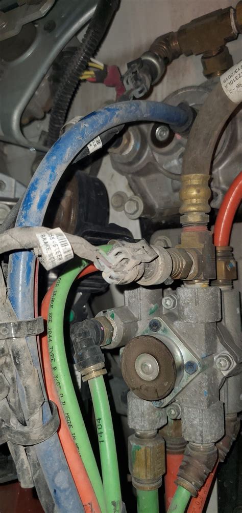 The tractor's air-lines connect to the trailer's air-lines via metal connectors known as gladhands. . Kenworth traction control valve location